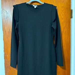 Black knee length dress.